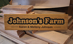 aaron johnson wooden sign example 1000 x 250